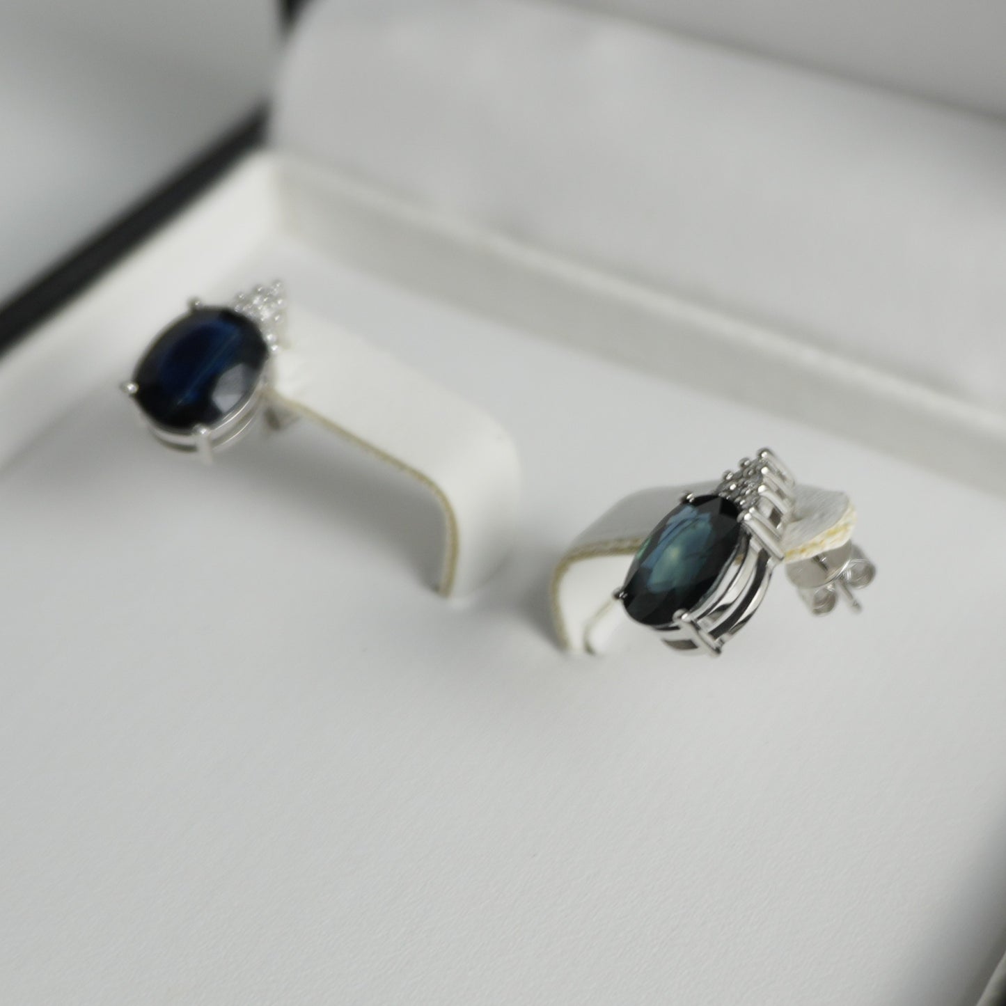 Diamond and sapphire white gold earrings. 4.42ct total sapphire weight.