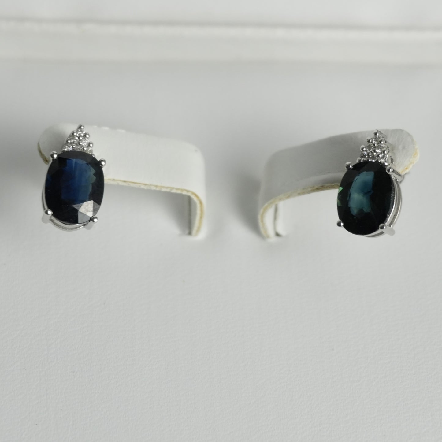 Diamond and sapphire white gold earrings. 4.42ct total sapphire weight.