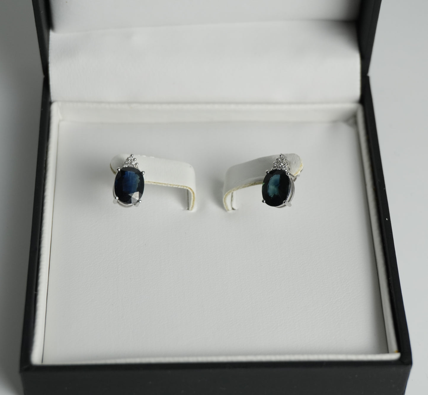 Diamond and sapphire white gold earrings. 4.42ct total sapphire weight.