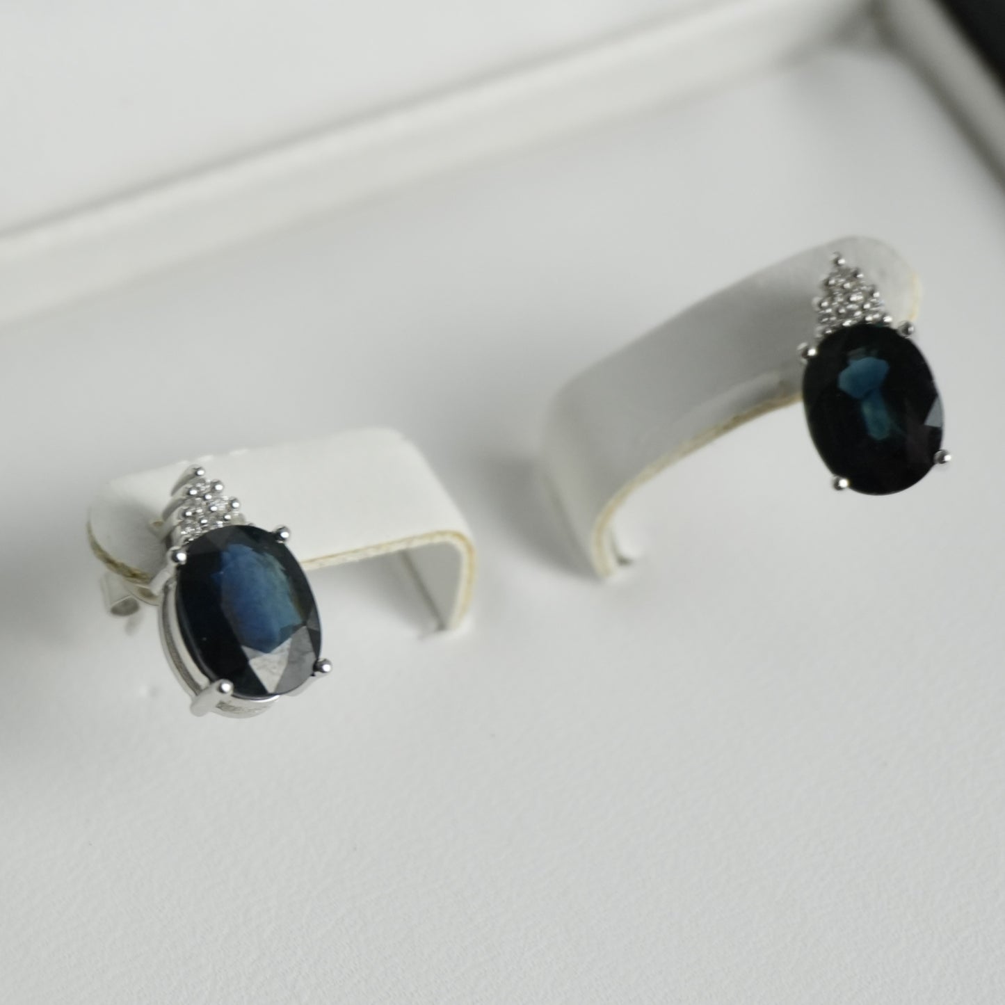Diamond and sapphire white gold earrings. 4.42ct total sapphire weight.