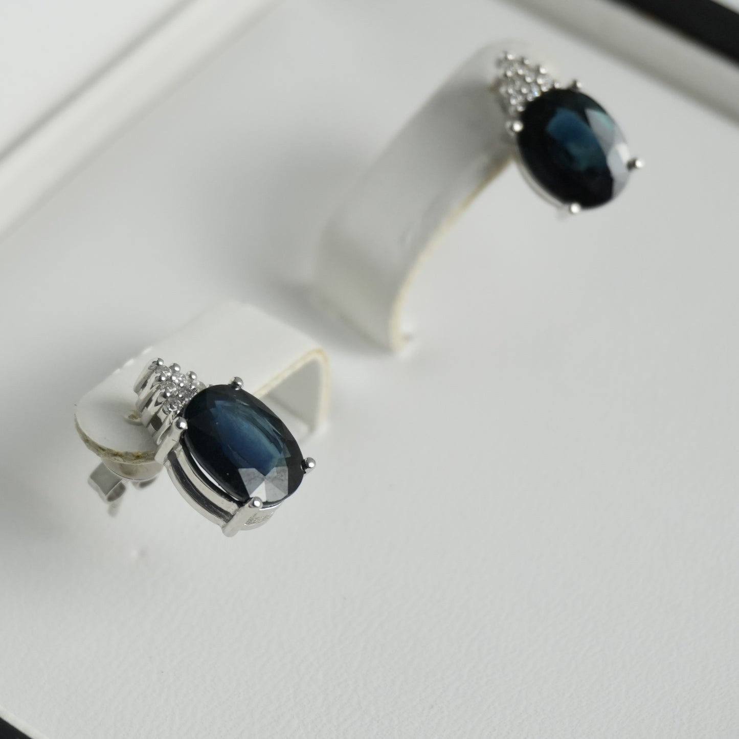 Diamond and sapphire white gold earrings. 4.42ct total sapphire weight.
