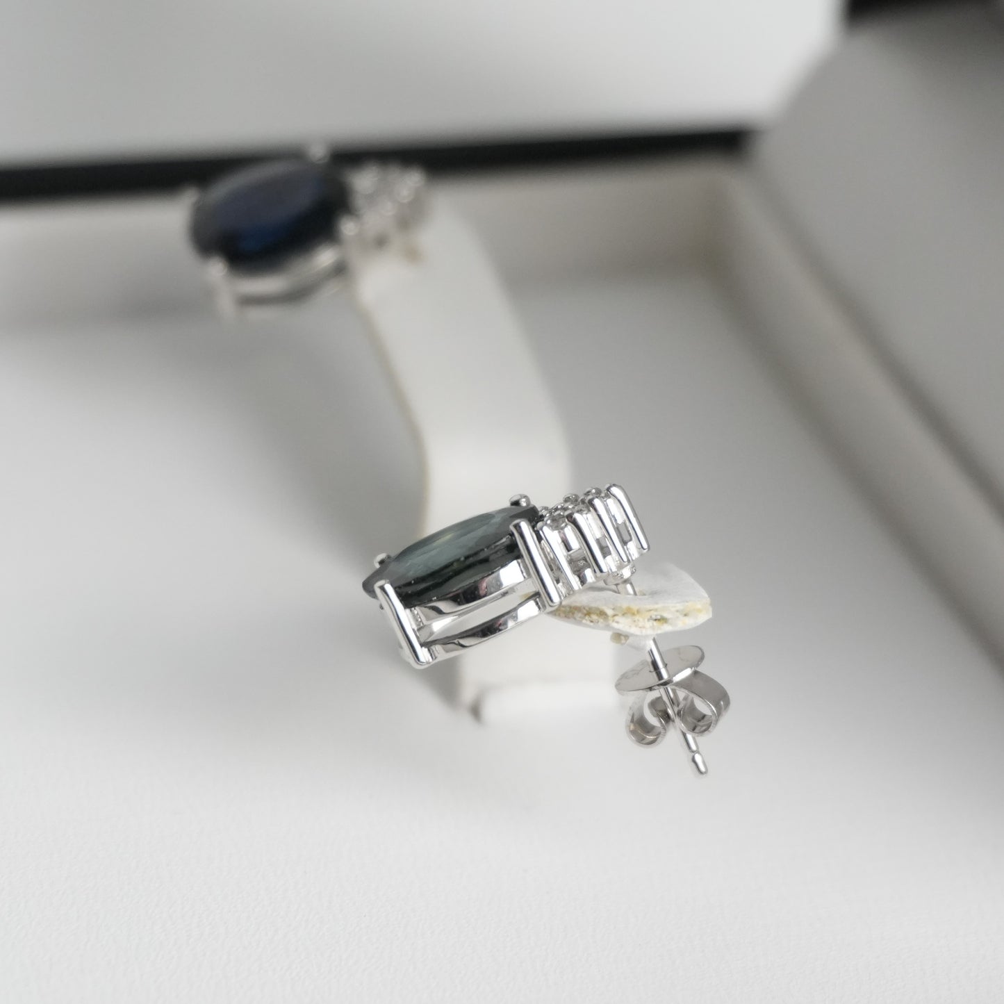 Diamond and sapphire white gold earrings. 4.42ct total sapphire weight.