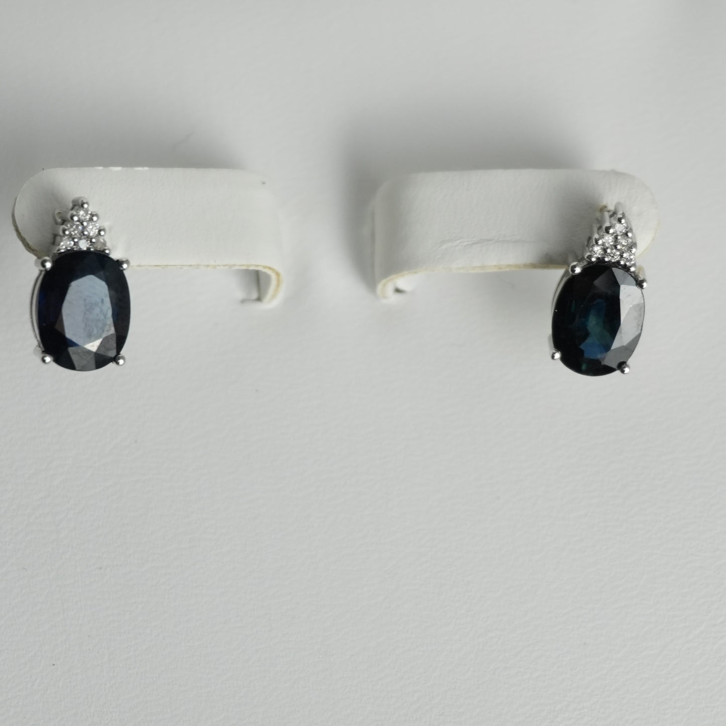 Diamond and sapphire white gold earrings. 4.42ct total sapphire weight.