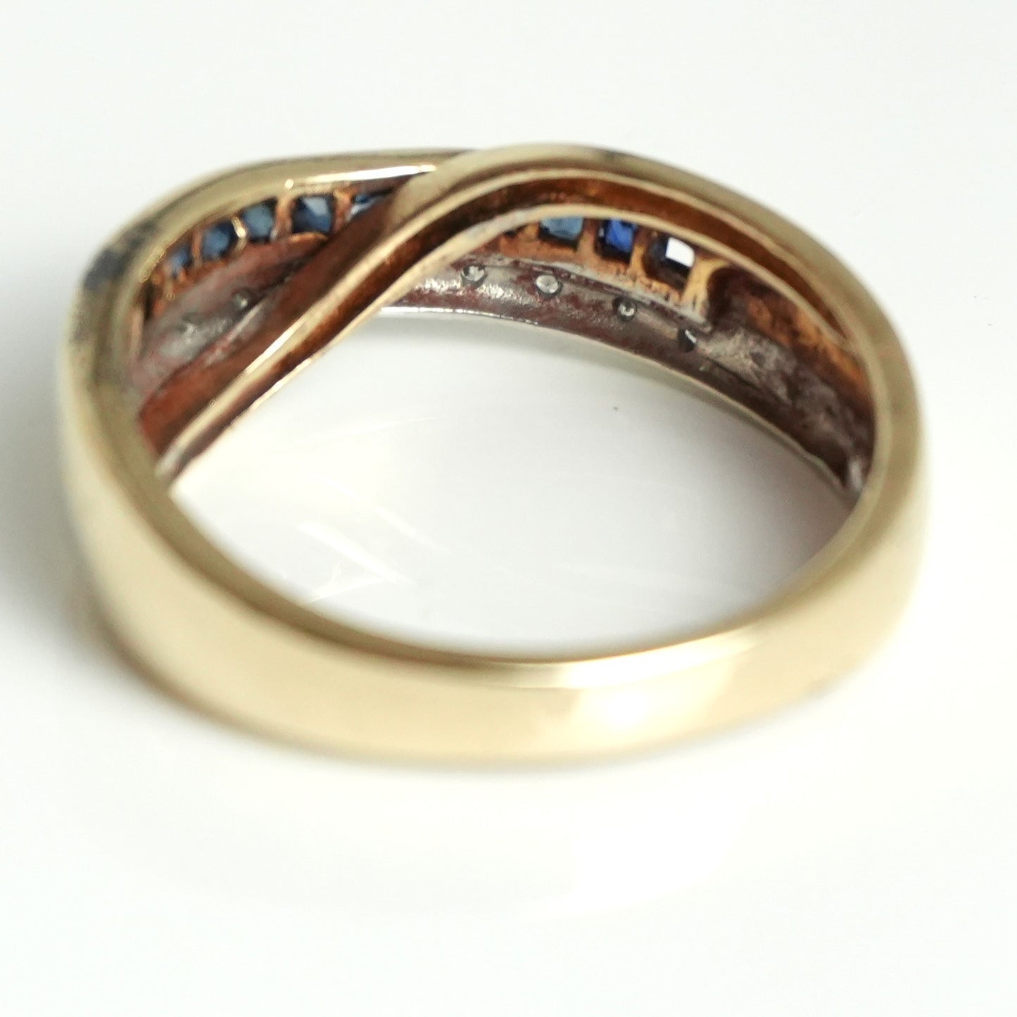 Diamond and sapphire channel style ring, featuring 0.55 carats of sapphires and 0.07carats of diamonds.