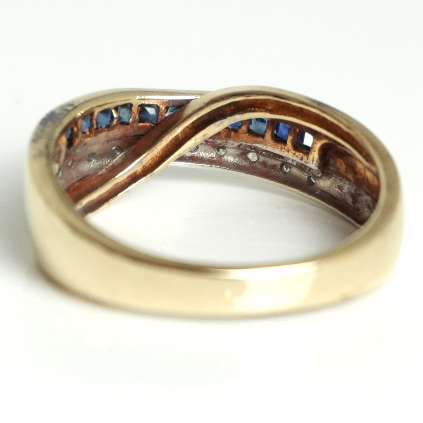 Diamond and sapphire channel style ring, featuring 0.55 carats of sapphires and 0.07carats of diamonds.